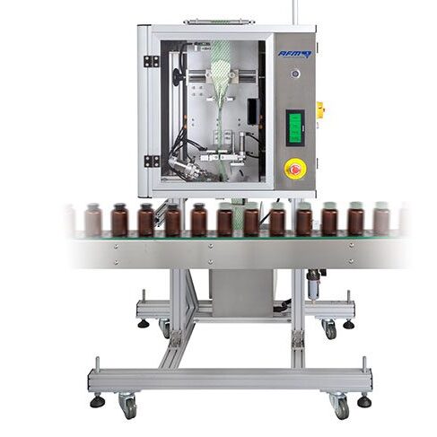 Machine for shrink sleeves